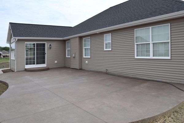 New,Home,House,Construction,Concrete,Cement,Foundation,Patio,Builders,Smooth